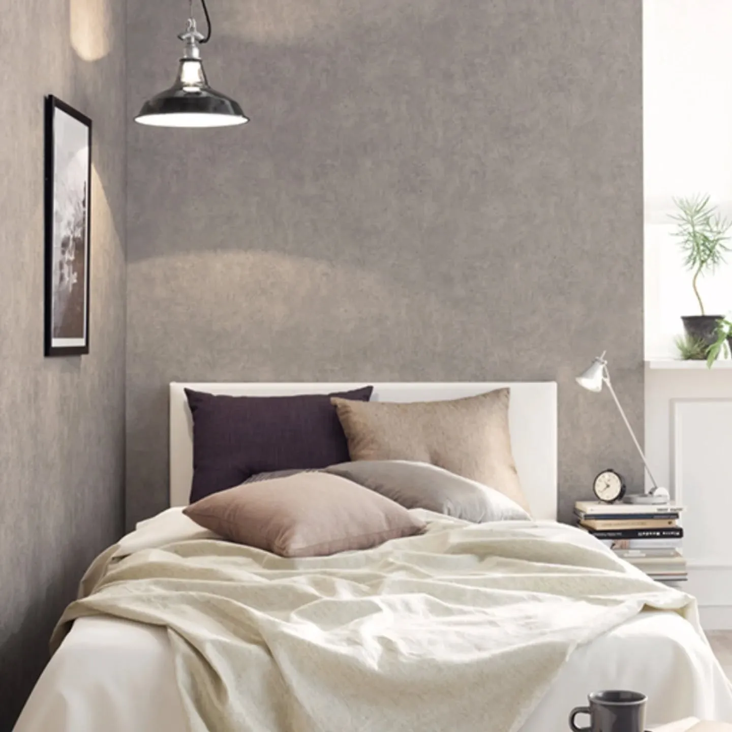 リアルな質感が魅力のグレーのコンクリート調クロス。